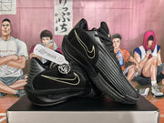Angled view of black Nike KD sneakers highlighting the side branding, layered panels, and laces.