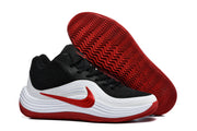 Nike 998-1 sneakers with the red wavy outsole visible