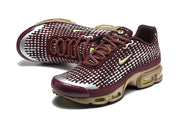 Pair of burgundy and silver Nike Air Max Plus VII sneakers viewed from above and the side.