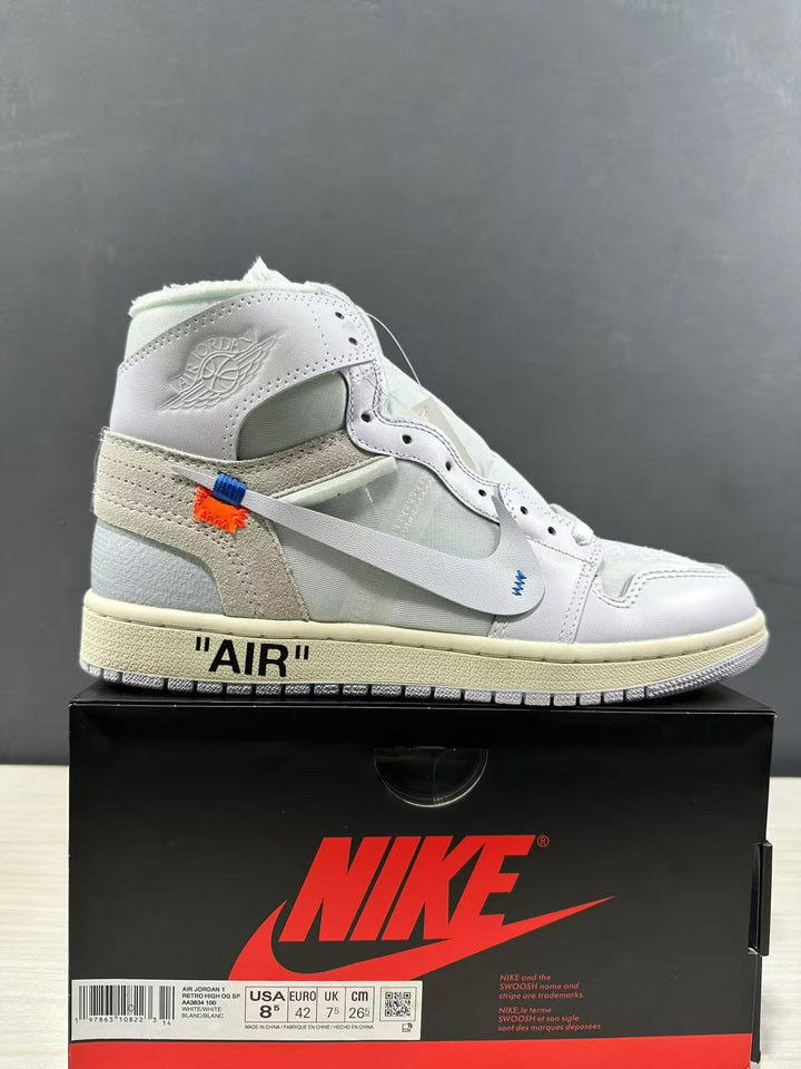 White high-top sneaker displayed on a Nike-branded box; the box label visibly shows EU 42 and style code AA3834-100.
