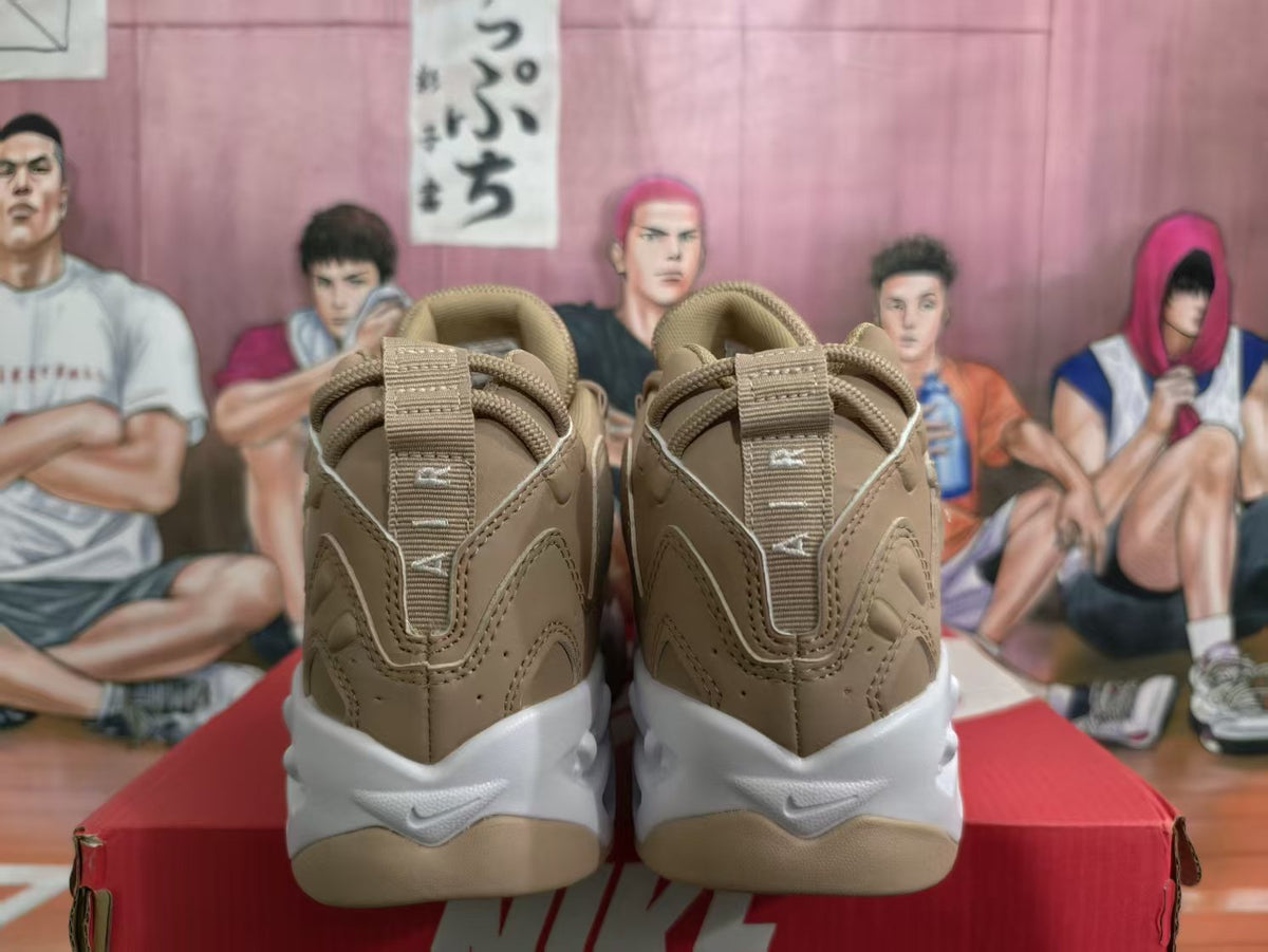 Rear view of khaki Nike sneakers showing padded collars, heel panels and white sculpted soles.