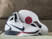 Basketball shoe side view alongside a view of its patterned outsole