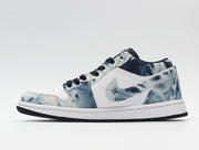 Side profile highlighting the low-top shape, white side panel and denim-look overlays.