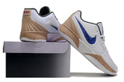 White Nike Ja 2 shoes shown from the rear and side beside a shoe box