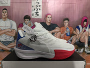 Side view showing white basketball shoes with blue heel accents and a red outsole.