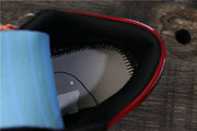 View inside the low-top sneaker showing its black collar and interior.