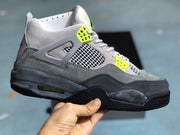 Side profile of the grey, black, and bright green high-top sneaker with a visible heel air window.