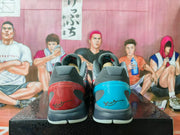 Rear view of the sneakers showing contrasting blue and red heel panels with Kobe-related script logos.