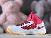 Side view highlighting the red mesh panels and white upper