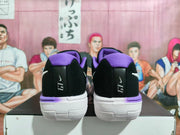 Rear view showing purple collars, black heels, and white outsoles