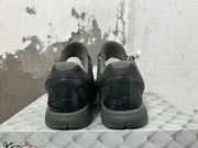 Rear view of the dark Nike Kobe 6 shoes showing heel details and signature graphics