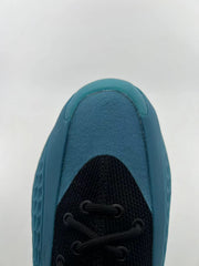 Top view of the blue toe panel and black lacing