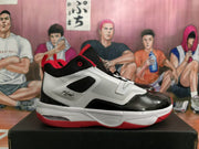 Side view showing the white upper, black overlays, red accents, and Flight text