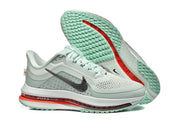 Nike Pegasus Premium shoes showing the perforated upper, black Swoosh, layered sole, and mint outsole.