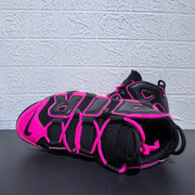 Top view showing pink laces and black uppers