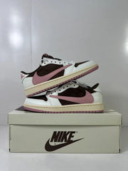 Two sneakers arranged together to show their side profiles and pink outsole edges.