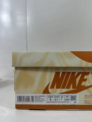 Close-up of the shoe box label showing Air Jordan 1 High OG, style code FD2596-021, color Brown/Black/White, and sample size EU 41.