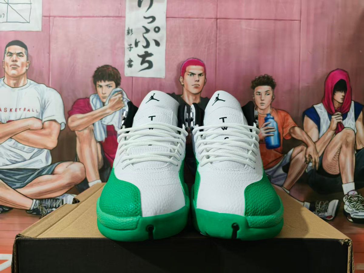 Front view of white and green Jordan high-top sneakers with Jumpman tongue logos