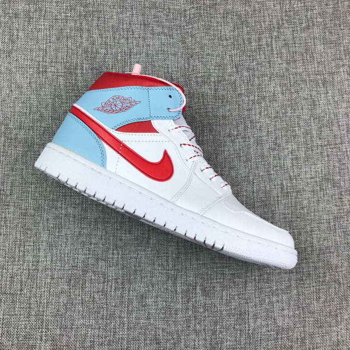 Side view of a white, ice blue, and red Jordan Air Jordan 1 Mid sneaker.