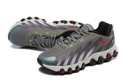 Pair of gray Nike Air Max DN sneakers viewed from above at an angle.