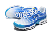 Pair of blue and white Nike Air Max Plus VII sneakers viewed from above