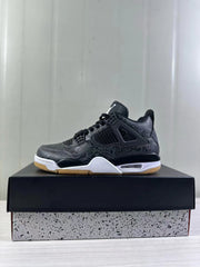 Side profile of a black Air Jordan 4 sneaker showing the tonal patterned upper, black side cage, white midsole accents, and gum outsole.