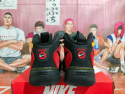 Rear view showing black heel panels, red side sections, and visible branding details.
