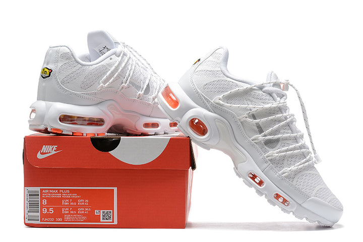 White and orange Nike Air Max Plus sneakers displayed on a Nike box; label reads FJ4232 100 and shows a sample size.