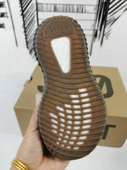 Underside view showing the ribbed gum-colored outsole and translucent central section.