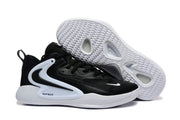 Black-and-white 920-3 sneaker colorway shown beside its patterned outsole.