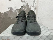 Front view of the dark Nike Kobe 6 shoes with textured uppers and lace-up closure