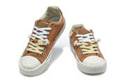 Pair of brown low-top lace-up sneakers with off-white toe caps and mixed-color laces.