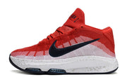 Side profile of red and white Nike GT Hustle 3 basketball shoe.