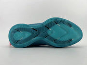 Full view of the blue outsole with molded traction pattern