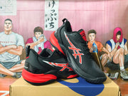 Black and red basketball shoes displayed at an angle