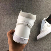 Close-up of the heel showing the grey collar and layered rear panels.
