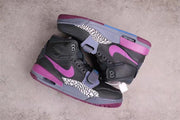 Overhead view of the pair showing the purple, grey, black, and blue color blocking.