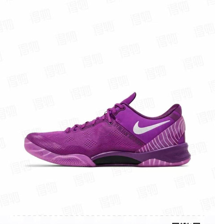Purple Kobe 8 basketball sneaker shown in side profile with a white swoosh and patterned heel panel.