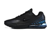 Side view of a black Nike sneaker with blue accents and a visible heel air unit.