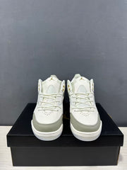Front view of the pair showing the laces, perforated toe areas and tan overlays.