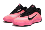 Pair of black-and-pink Nike A'ja Wilson 1 basketball shoes shown from a front three-quarter angle.