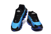Front view of the pair highlighting the blue toe areas and black laces.