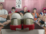 Rear view showing the white and beige heel panels, red midsoles, and textured outsole sections.
