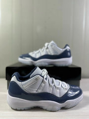 Close side view highlighting the white upper and glossy blue overlays
