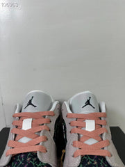 Close-up of the tongues, black Jumpman logos, and pink laces.