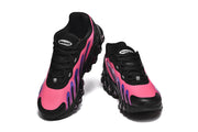 Top and front views of pink and black Nike Air Max DN8-style sneakers