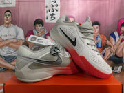 Nike Ja 2 shoes shown from the side, with perforated panels and red outsole accents