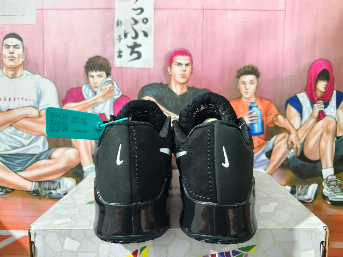 Rear view of black Nike sneakers with white heel logos and glossy black heels.