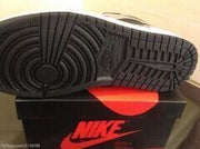 Underside view showing the circular traction pattern on the black outsole.