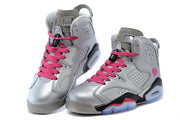 Two silver-gray high-top sneakers displayed from the front, showing pink laces, perforated panels, and padded collars.